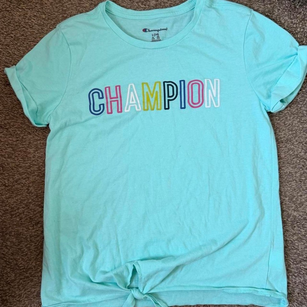 Champion baby tee with rainbow-colored 'CHAMPION' text, size L (14)